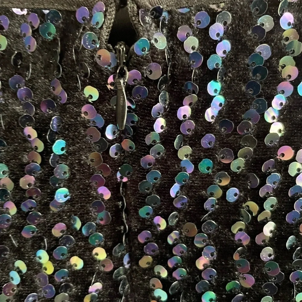 Molly Bracken multi color sequins black mini skirt. Size XS.